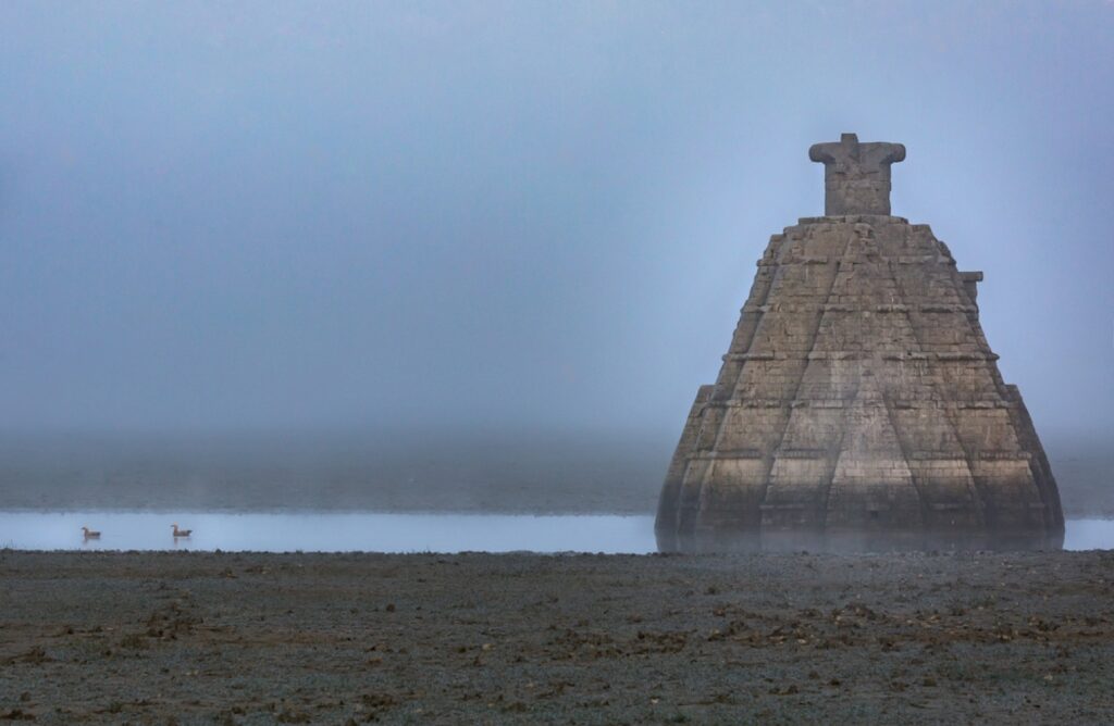 Every winter the water in the Gobind Sagar Lake in Himachal Pradesh recedes to expose the ruins of medieval temples that lie submerged for the rest of the year transformed e1683282558832