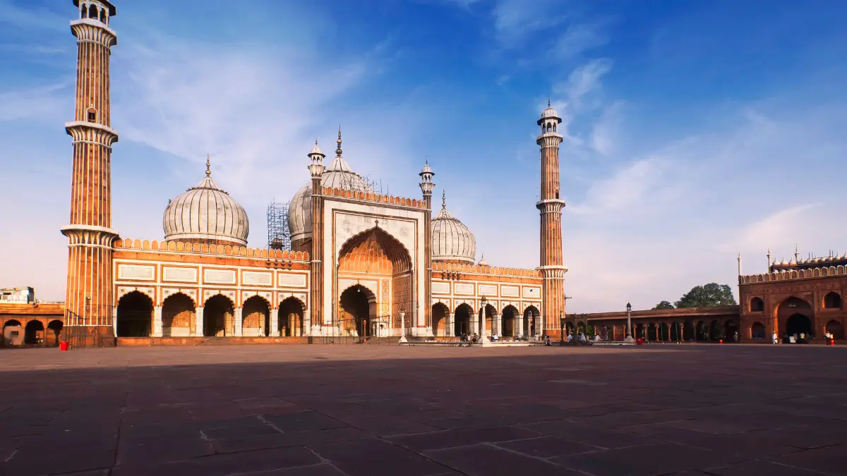  A photo of Jama Masjid, a large mosque made of red sandstone and white marble. The mosque is located in Delhi, India.
