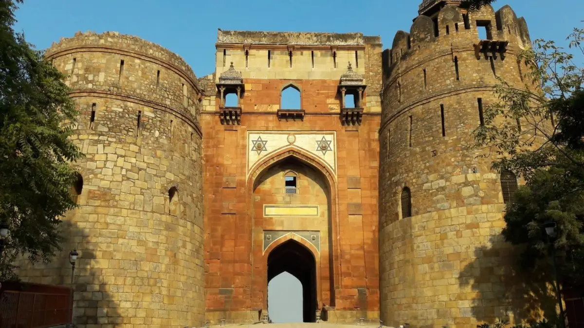 Photograph of Purana Qila, a red sandstone fort in Delhi. The fort is situated on the Yamuna River's banks.
